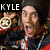A pixelated image shows a person with long dark hair wearing a black jacket over red clothing, holding a circular object near their face in two sequential poses.