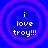 Four identical circular icons with concentric purple rings on a blue background, each displaying white pixelated text reading "i love troy!!!".