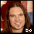 A 49x49 pixel animated contact sheet showing three frames of a person with long brown hair and blue eyes, each frame displaying slight variations in facial expression and the text "bo" at bottom right.