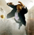 A pixelated figure in dark clothing with a brown hat appears to be falling or diving against a light background with a small yellow object nearby.