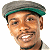 A split-frame contact sheet showing a pixelated portrait of a person wearing a gray cap with green trim on the left and bright green text reading "Original Icons .com" on a dark green background on the right.