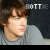 A pixelated image of a person in a gray shirt with the text 'HOTTIE' above, showing slight animation changes across frames.