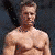 Four distinct black-and-white and colorized portraits of a shirtless man with styled hair, arranged in a