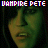 Pixelated static image featuring a stylized face with green and brown tones beneath pixelated text reading "VAMPIRE PETE" in blue, purple, red, white, and yellow blocks.