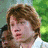 A red background with yellow text displays two character images: a boy with brown hair and a girl with long light brown hair, both from the Harry Potter series.