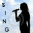 Silhouette of a person holding a microphone against a light blue sky background with vertical text reading "SING" on the left.