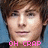 A pixelated image of a person with brown hair and light skin, featuring three text overlays in pink: 'OH CRAP', 'he's hot', and '*burned*'.