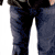 A 4-frame animated contact sheet showing a person in dark hoodie and blue jeans performing a downward motion across frames.