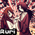 Pixelated anime-style character with brown hair and red robe, holding hands in prayer pose against pink floral background.