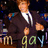 A pixelated image of a person in a dark suit with white shirt and tie, standing against a blurred background with text overlays.