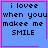 Blue square with pink border contains pixelated text 'i lovee when youu makeee me SMILE' and a small heart symbol in bottom-right corner.