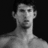 Black-and-white image of a shirtless man with short dark hair against black background, displayed in four
