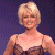 Pixelated image of a woman with short blonde hair in a sleeveless dress next to green text reading "Original Icons .com" on a dark background.