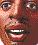 Pixelated face with brown skin tone, repeated in vertical showing sequential mouth and eye expressions