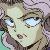 Pixelated close-up of a person's face with light skin, dark hair, and blue eyes, showing a neutral expression with mouth slightly open.