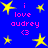 Blue background with yellow stars and pink text reading "i love audrey <3" in pixelated font.