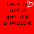 Red background with black pixelated text reading "Love is not a gift it's a PASION!" and a white heart symbol replacing the 'o' in 'is'.