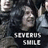 Pixelated static image of a person with dark hair and light skin, wearing a black shirt, against a dark background with white text reading "VERUS SMILE" below.
