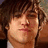 A pixelated image of a person with brown hair and light skin, next to blue background text reading "pete makes me melt" in white block letters.