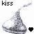 Two pixelated Hershey's Kisses with text 'kiss' and 'me' above them, each accompanied by a heart symbol.