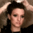 A 48x48 pixel buddy icon split into two frames showing a person with hands in hair on the left and green text "OriginalIcons.com" on a dark background on the right, part of an animated contact sheet.