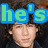 A pixelated image of a person with curly hair, featuring overlaid text in various colors and styles across different sections.