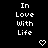 Pixelated text "In Love with Life" appears in three vertical above heart symbols on a black background, with one gray rectangle visible at the bottom right
