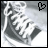 Pixelated grayscale image of a shoe with a heart symbol in the top-right corner, showing animation change in the heart's fill state.