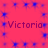 A static image with a bright pink background featuring repeated blue star-like patterns and the word "Victoria" in dark pink text.