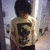 A pixelated image shows a person in a yellow shirt with a dark graphic on the back, standing against a light background, next to bold white text reading "OH NO SONNY" on a black background.