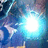 A pixelated static image with a bright white central glow surrounded by blue and purple hues, featuring scattered light streaks and faint star-like shapes.