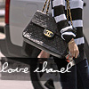 A person holds a black quilted handbag with a gold interlocking CC logo, wearing a black and white striped top with a gold bracelet, with 'love chanel' text overlaid.