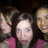 A pixelated image shows multiple figures in pink tops against a dark background with pink text reading '<333 Them' in the upper right.
