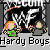 Pixelated static image featuring two cartoon characters in a wrestling ring with bold text above and below, rendered in low-resolution 8-bit style on gray background.