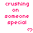 Pixelated red text reading "crushing on someone special" with small red hearts, arranged in a on a white background