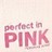 Pixelated text reads 'perfect in PINK' on a light pastel background with subtle green and blue tones.