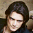 A pixelated image of a person with dark hair on the left side and bold black text reading "I wanna move to Orlando!" on the right side against a beige background.