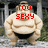 A sumo wrestler statue with red text overlays reading "TOO SEXY FOR MY SHIRT" across three