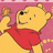 Pixelated yellow bear with black nose and eyes, wearing red shirt, holding honey pot against pink background.