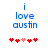 Blue text 'i love austin' above red and pink heart icons on white background, with animation changing heart positions.