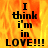 Flame background with black text reading "I think i'm in LOVE!!!" displayed across four , two showing full flames and two grayed-out sections