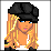 Pixelated character with blonde hair and black hat, wearing white top and black jacket, standing in front of pink text reading "Livin It Up".