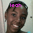 Pixelated portrait of a smiling person with short dark hair, pink text reading 'leah' overlaid on the forehead against a light background.