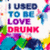 Pixelated text reads "I USED TO BE LOVE DRUNK" in stacked lines with color-coded letters over a multicolored abstract background.