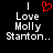 A black background displays two identical pixelated text blocks reading "Love Molly Stanton..." with a red heart symbol above the left block.
