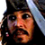 A 2x2 contact sheet of three animated frames showing a pirate character with long dreadlocks, tricorn hat, and facial hair in various poses against outdoor backgrounds.