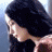A 48x48 pixel buddy icon featuring a side-profile of a person with dark hair and a brown top, next to "The Lord of the Rings: The Return of the King" text in gold lettering on a textured background.