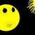 Yellow circular face with black eyes and mouth on dark background, showing animation of a sideburn-like element appearing on the right.