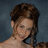 Pixelated image of a person with brown hair styled up, wearing no visible clothing on shoulders, against a blue background with pink text reading 'my', 'faveorite', and 'owner'.