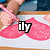 A hand draws two pink hearts on white paper with a red pen, while text overlays change across frames.